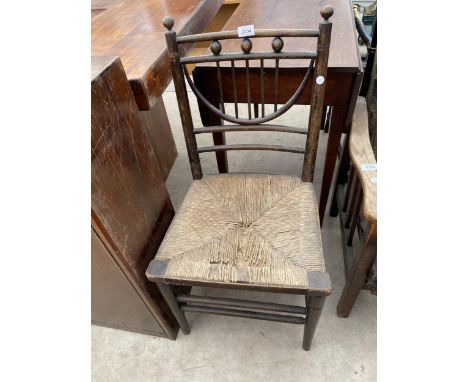 AN ARTS &amp; CRAFTS SINGLE BEDROOM CHAIR WITH RUSH SEAT 