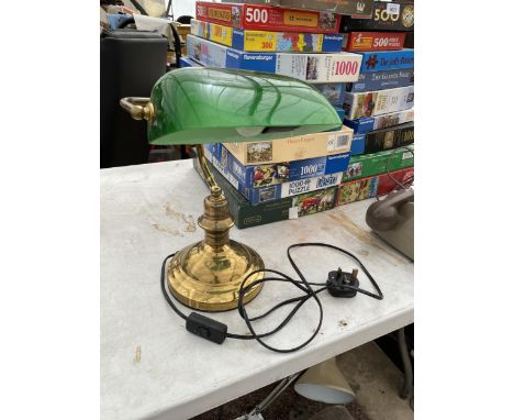 A BRASS BANKERS LAMP WITH GREEN GLASS SHADE 