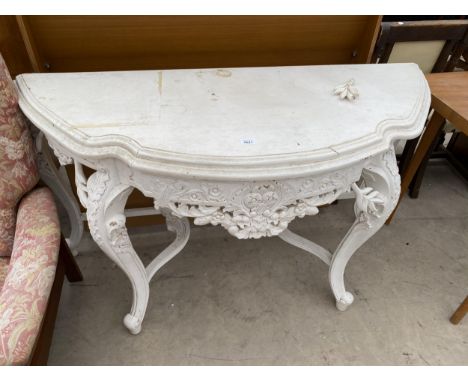 A 19TH CENTURY STYLE WHITE PAINTED CONSOLE TABLE, 56" WIDE WITH CARVED FOLIATE DECORATION 