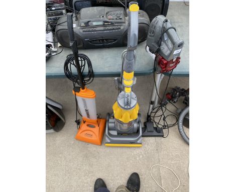 THREE VACUUM CLEANERS TO INCLUDE AN EGL STICK VACUUM, A POWER FOAMER AND A DYSON 