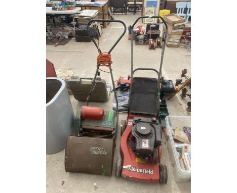 A MOUNTFIELD PETROL ENGINE LAWN MOWER AND A VINTAGE QUALCAST PUNCH EP30 LAWN MOWER 