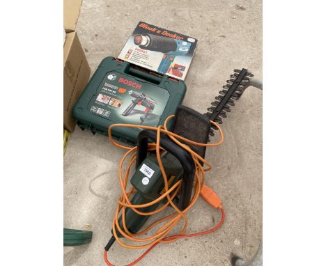 AN ASSORTMENT OF TOOLS TO INCLUDE A BOSCH DRILL AND A BLACK AND DECKER ELECTRIC HEDGE TRIMMER 