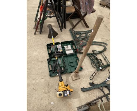 AN ASSORTMENT OF TOOLS TO INCLUDE A BOSCH JIGSAW A DRILL AND A PETROL ENGINE GRASS STRIMMER 