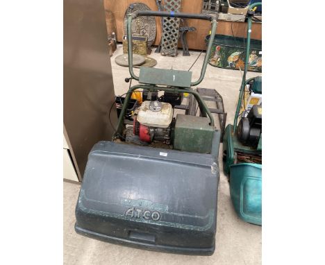 AN ATCO PETROL ENGINE LAWN MOWER COMPLETE WITH GRASS BOX 