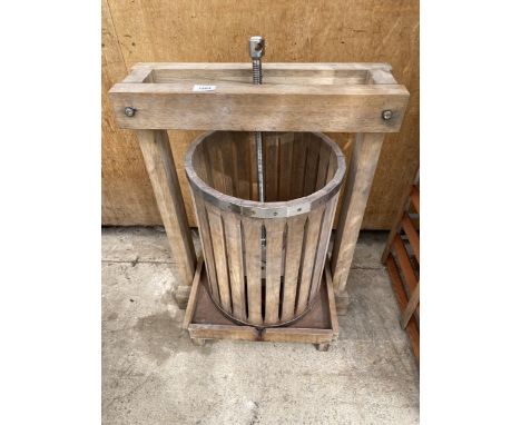 A VINTAGE WOODEN FRUIT PRESS IN WORKING ORDER BUT NO WARRANTY 