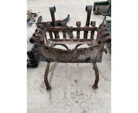 A VINTAGE CAST IRON FIRE GRATE WITH FIRE DOGS 