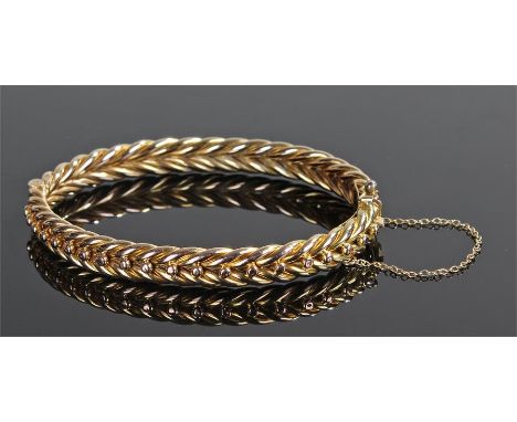 15 carat gold bangle, of rope twist and ball design, 19 grams, cased