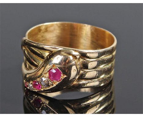 18 carat gold diamond and ruby ring, in the form of a coiled snake, ring size R