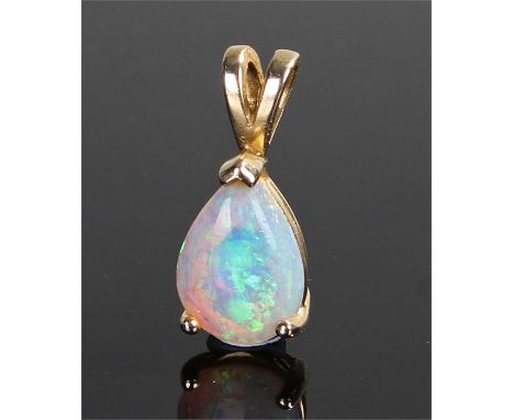 9 carat gold opal set pendant, with a tear drop opal to the gold mount