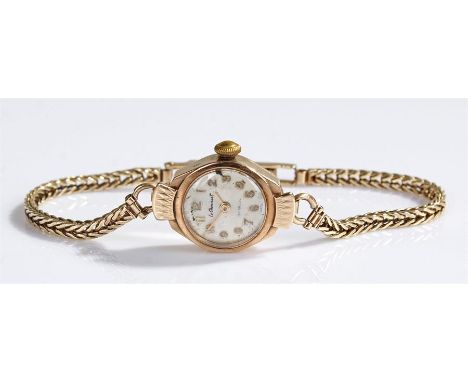 Le Cheminant ladies 9 carat gold wristwatch, the signed silvered dial with Arabic hours, manual wound, case 16mm diameter 