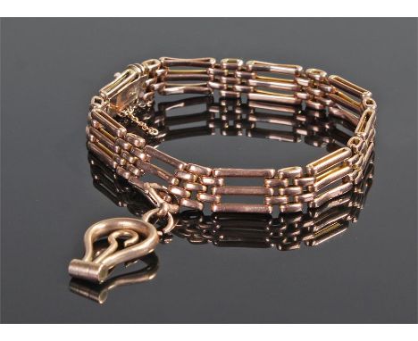 9 carat gold bracelet, with pair links, 9 carat gold hinged button hook to the bar, total weight 13.5 grams
