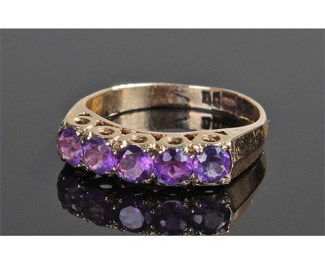 9 carat gold ring, set with amethysts to the head, ring size K