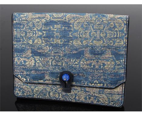 Cartier clutch handbag, the silk bag with a lapis lazuli and diamond set catch button, Cartier Paris signed to the inner flap