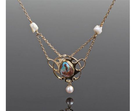 Art Nouveau opal and pearl  pendant necklace, in the Liberty's taste, the central opal with arched frame surround and pearls,