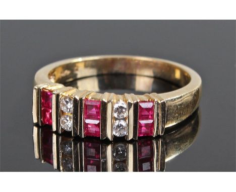 14 carat gold diamond and ruby ring, with six square rubies and four round cut diamonds, ring size R