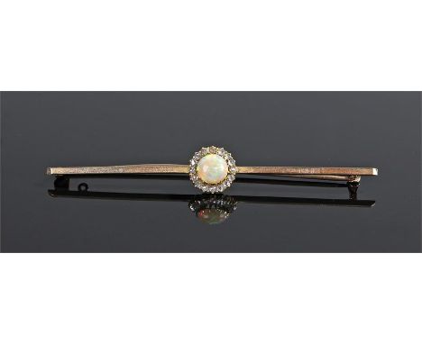 Opal and diamond bar brooch, the circular opal with diamond surround to the bar brooch, 8cm long