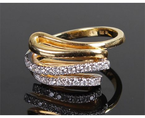 18 carat gold and diamond ring, the ring with wavy diamond set bars, ring size R