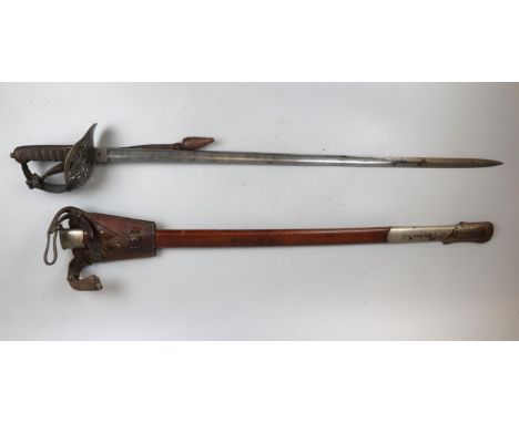 Antique sword by Wilkinson in scabbard 