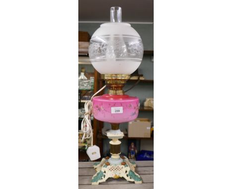 Oil lamp on cast iron base 