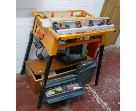 Tritan router table together with various other tools 