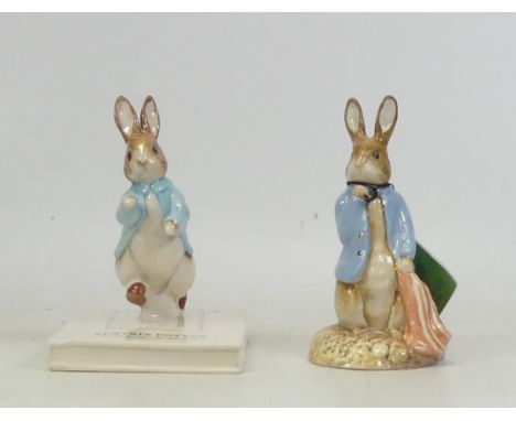 Beswick, Beatrix Potter figures Peter on his Book P4217 and Peter and a Red Handkerchief. Both boxed. (2)