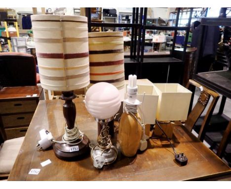 Six mixed lamps, wood and metal. All electrical items in this lot have been PAT tested for safety and have passed. This does 