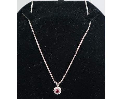 White gold ruby and diamond set necklace 