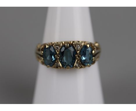 Gold blue topaz &amp; diamond set ring - Approx size: N½ 