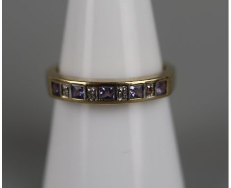 Gold tanzanite &amp; diamond set ring - Approx size: O 