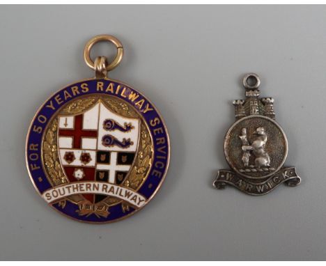 Gold railway medal together with silver Warwick bear pendant 