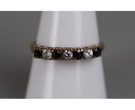 Gold sapphire &amp; CZ set ring - Approx size: R 