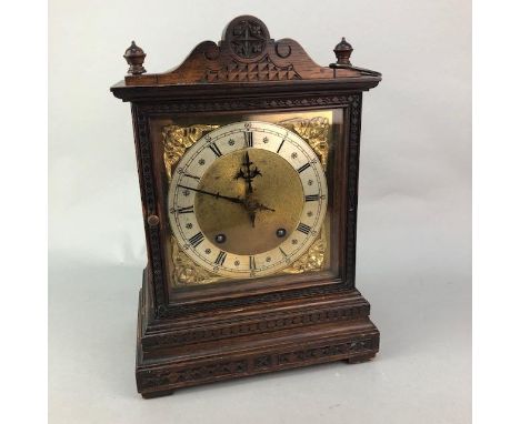 VICTORIAN MANTEL CLOCK, with silvered chapter ring, in an oak case, 31cm high