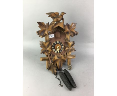 SWISS CUCKOO CLOCK, with weights and pendulum, 30cm long