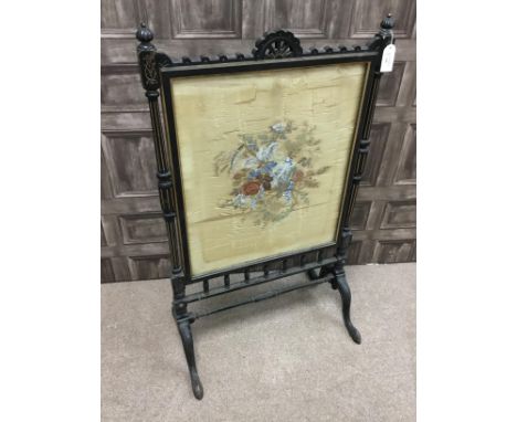 19TH CENTURY AESTHETIC MOVEMENT FIRESCREEN, with painted silk panel and ebonised frame, 63cm wide