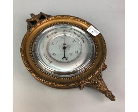 WALL BAROMETER, of circular form, with Neo-Classical style detail, 24cm diameter, 38cm long