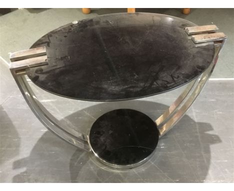 A CHROME PLATED AND GLASS ART DECO STYLE OCCASIONAL TABLE  the oval top 80cm x 55cm, 56cm high