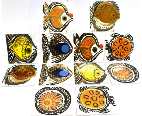 A COLLECTION OF TWELVE 1960S CERAMIC TILES  from the H &amp; R Johnson 'Cristal' range, decorated with stylised fish etc., 11