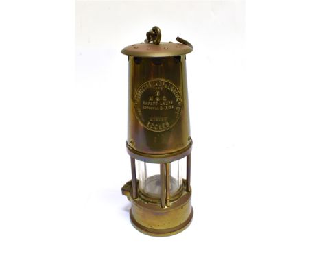 A BRASS MINER'S 'TYPE 6 - M &amp; O' SAFETY LAMP BY THE PROTECTOR LAMP &amp; LIGHTING CO. OF ECCLES  of regulation pattern, w