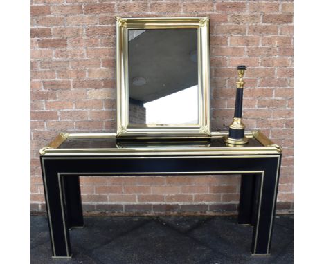 A GILT METAL MOUNTED CONSOLE TABLE  148cm wide 41cm deep 77cm high, matching mirror 84cm x 66cm overall and a table lamp 50cm