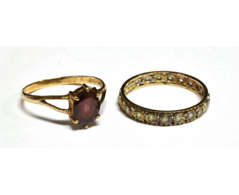 TWO VINTAGE 9CT GOLD AND GEM RINGS, INCLUDING AN OVAL GARNET SINGLE STONE RING London 1979, size N, 1.5g gross; and a 9ct gol