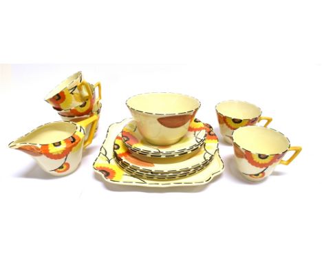 A CROWN DUCAL 'ART DECO' PART TEA SERVICE  (Regd. No. 780960) with painted floral decoration comprising five tea cups, three 