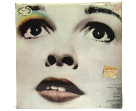 RECORDS - ASSORTED  Sixteen long-playing records, by Judy Garland (4); Fleetwood Mac (2); Magna Carta (1); Don McLean (1); an