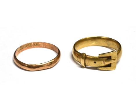 A 9CT ROSE GOLD WEDDING BAND RING AND A 9CT GOLD BUCKLE RING the 'D' section wedding band Chester 1932, size M+, 0.5g; the bu