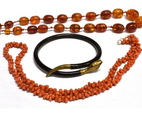 AN EARLY 20TH CENTURY BALTIC AMBER OVAL-BEAD NECKLACE AND OTHER ITEMS the amber necklace approx. 52cm long overall (20 ½ in);