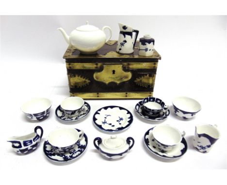 A MINIATURE PART TEA-SERVICE  probably factory sample pieces or a doll's service, with variant decoration, the teapot 5.5cm h
