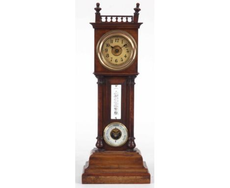 AN EARLY 20th CENTURY WALNUT MINIATURE LONGCASE STYLE MANTLE CLOCK with gallery top and column sides enclosing a clock, therm