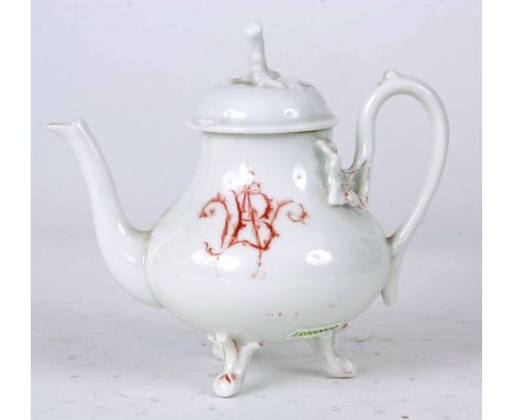 A 19th CENTURY PORCELAIN TEAPOT with crab stock handle feet and finial white decorated in red two cherubs chasing a butterfly