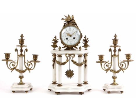 A LATE 19TH CENTURY WHITE MARBLE AND BRASS MOUNTED FRENCH CLOCK GARNITURE mounted with swag and bird decoration, the case sup