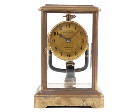 BULLE CLOCKETTE&nbsp;AN EARLY 20TH CENTURY ELECTRIC FOUR GLASS MANTLE CLOCK the brass case with stepped moulded top and four 