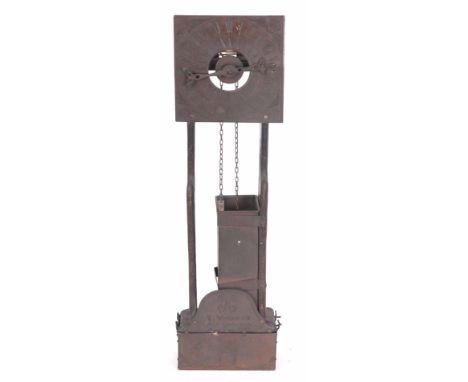 A 20th CENTURY BRASS AND OAK WALL HANGING 'CLEPSYDRA' WATER CLOCK having engraved 8" brass square dial on oak frame above sig